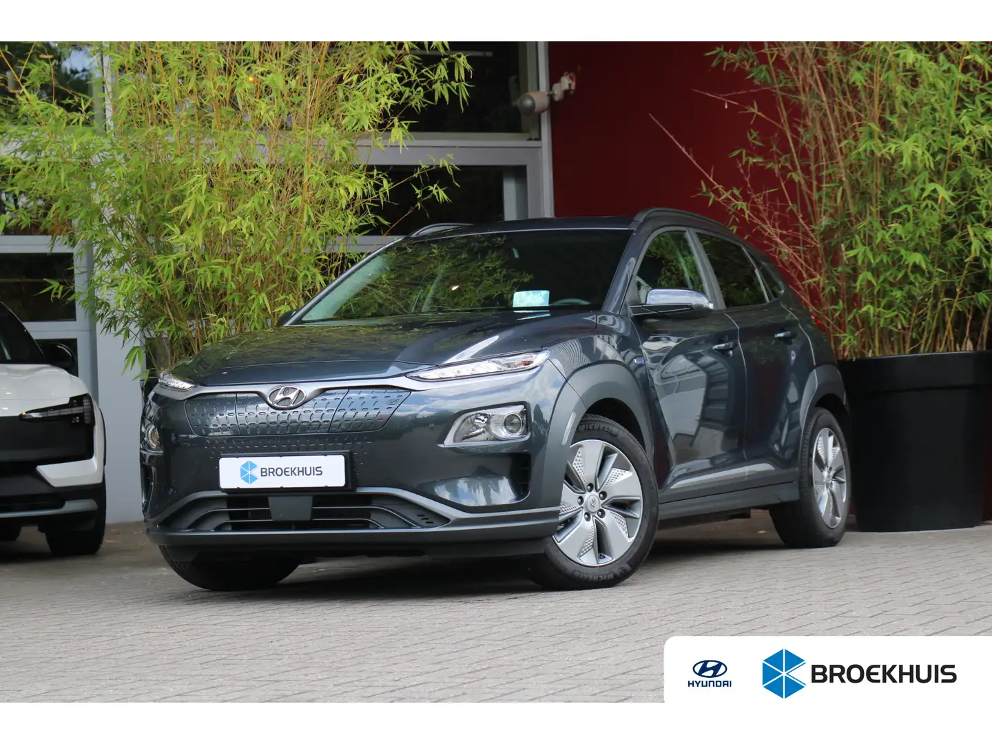 Hyundai KONA EV Fashion 64 kWh | BTW auto / 12% bijtelling | Tr Grijs - 1