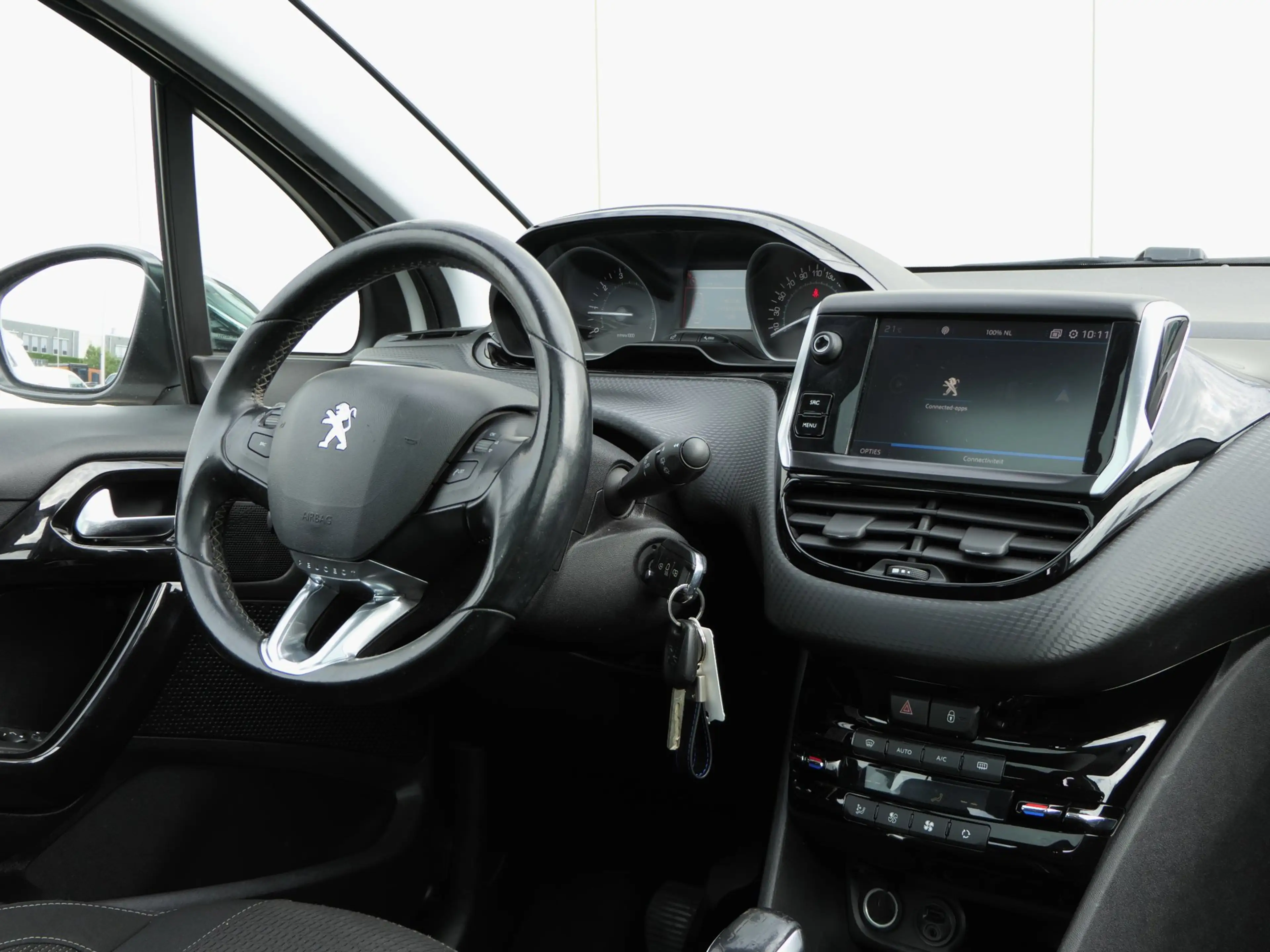 Peugeot 208 1.2 82PK Allure | Carplay | Panoramadak | Sportvel — photo 9