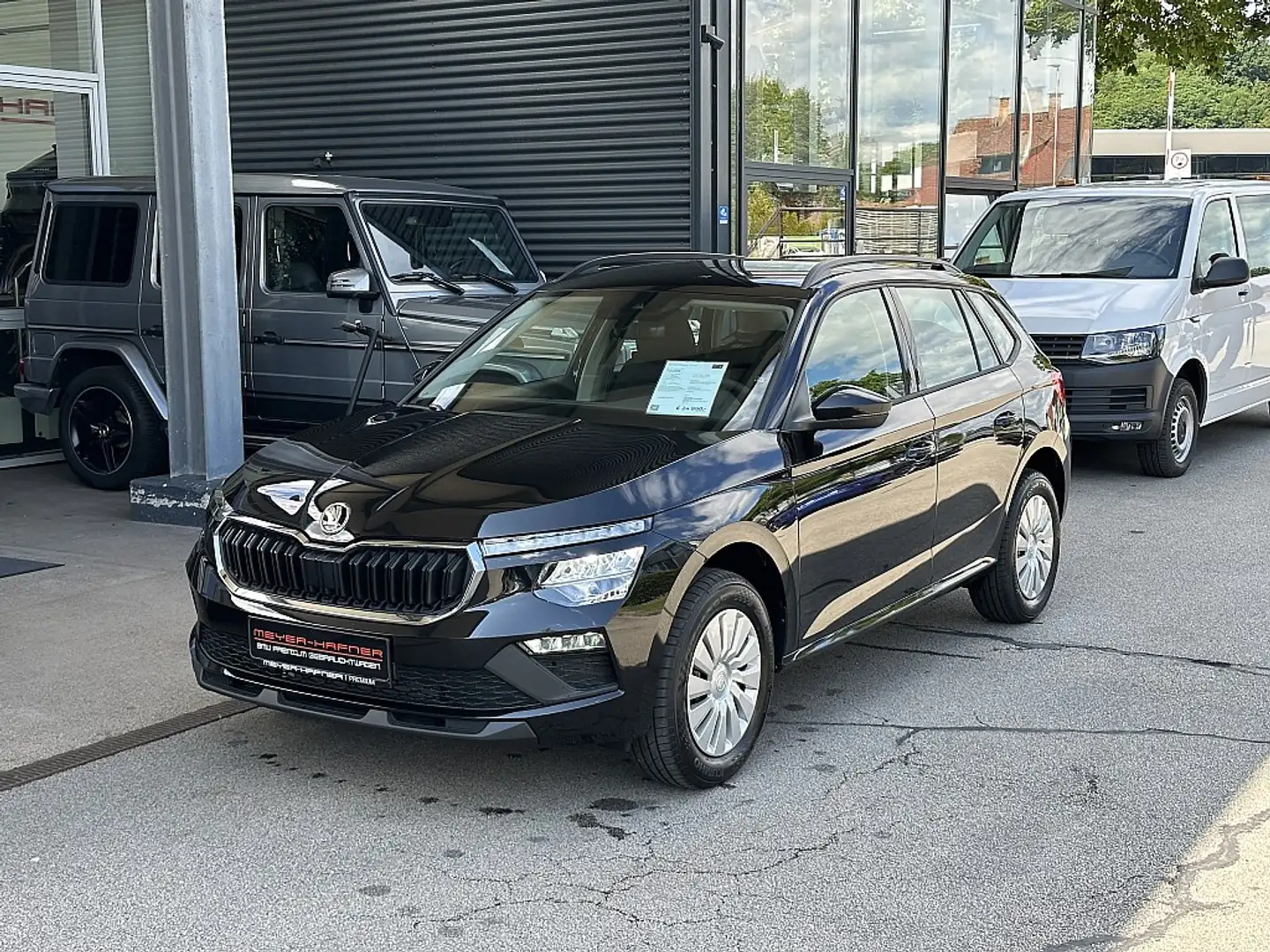 Skoda Kamiq 1,0 TSI Essence DSG Schwarz - 1