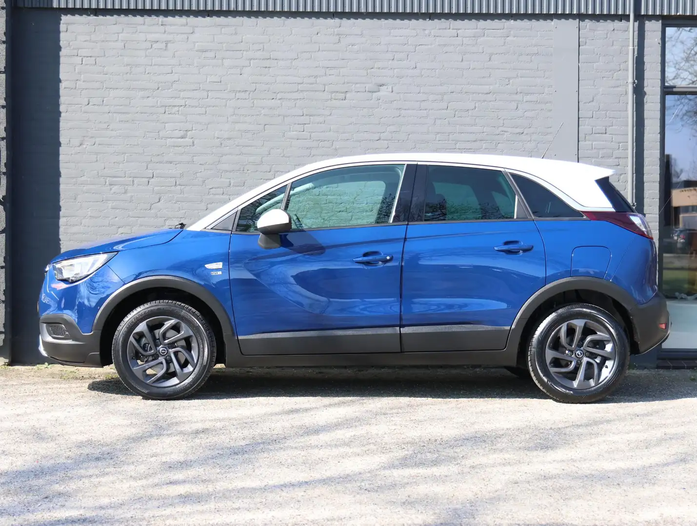 Opel Crossland X 110pk Turbo 120 Jaar Edition | 1ste eigenaar | Tre Blauw - 2
