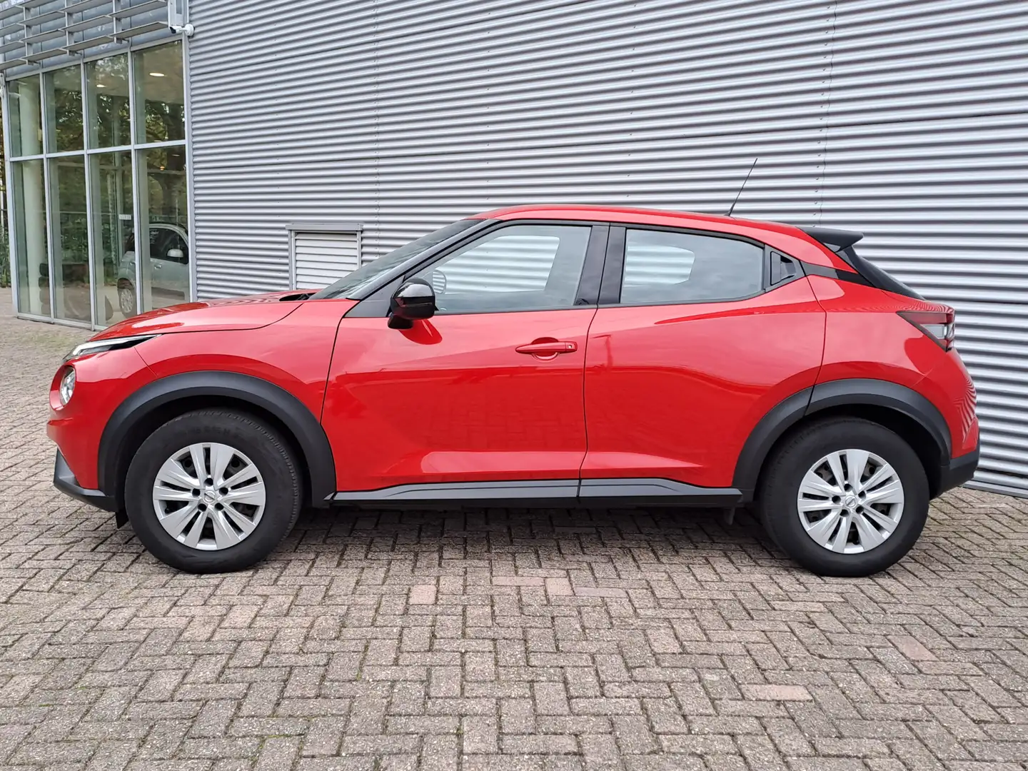 Nissan Juke 1.0 DIG-T Visia | Airco | Cruise | Dab | Bluetooth Rouge - 2