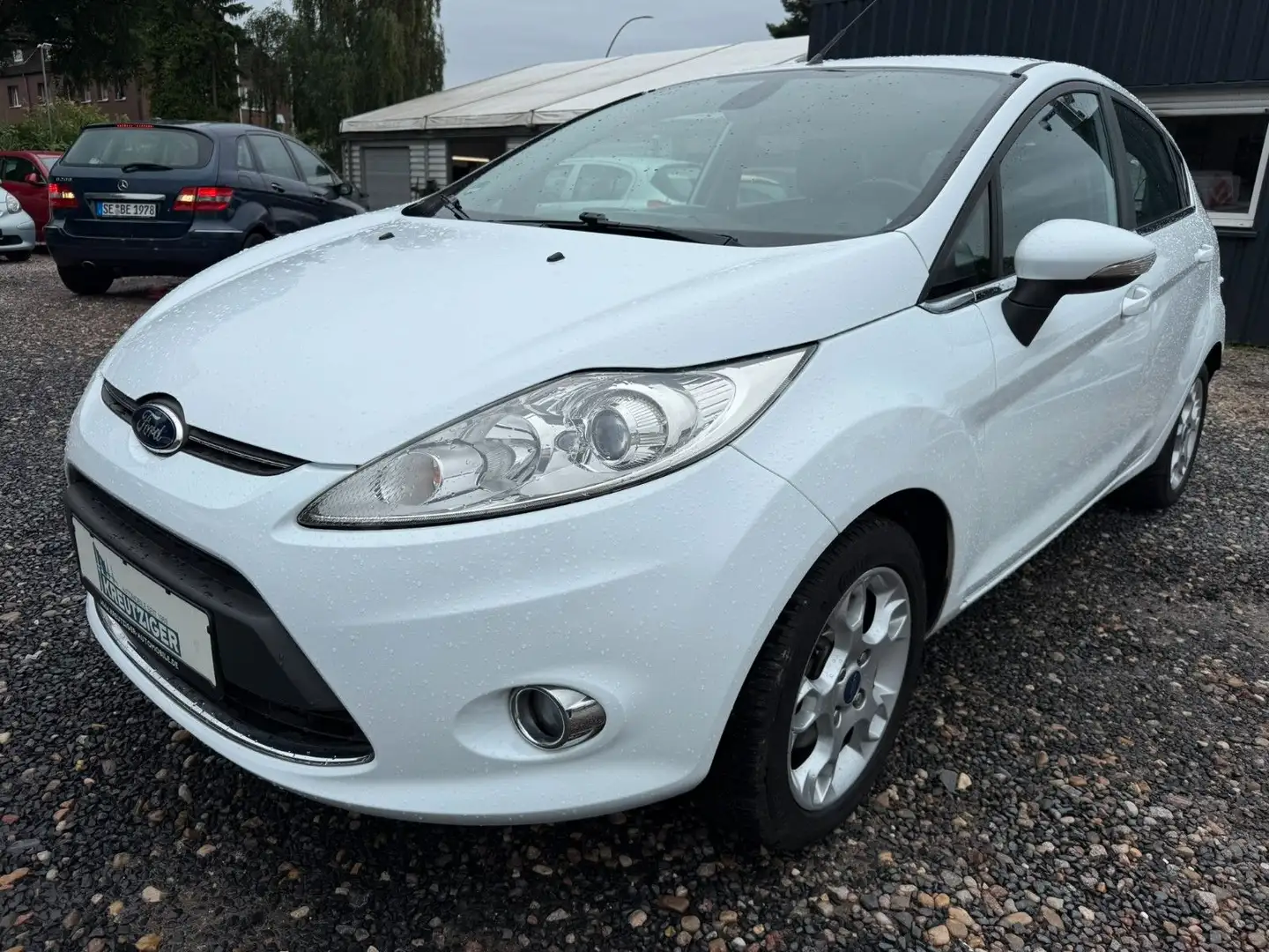 Ford Fiesta 1,25 60kW Titanium Weiß - 1