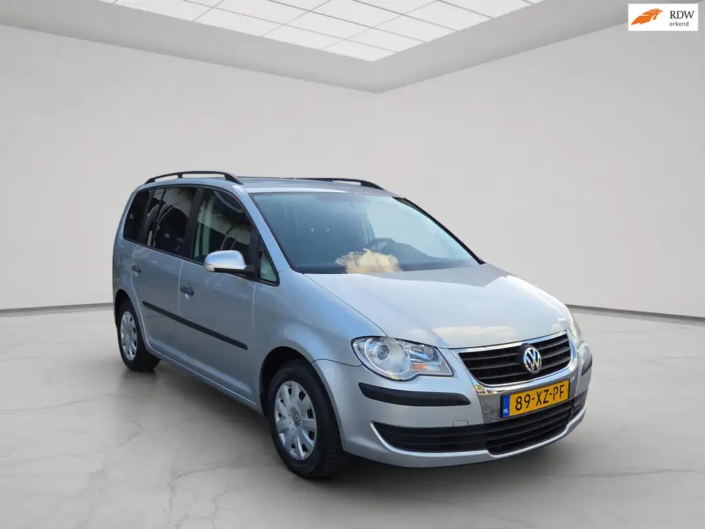 Volkswagen Touran 2007 из Европы — купить под ключ