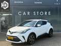 Toyota C-HR 1.8 Hybrid First Edition JBL|Navi|Afn Trekhaak|Sto Weiß - thumbnail 1