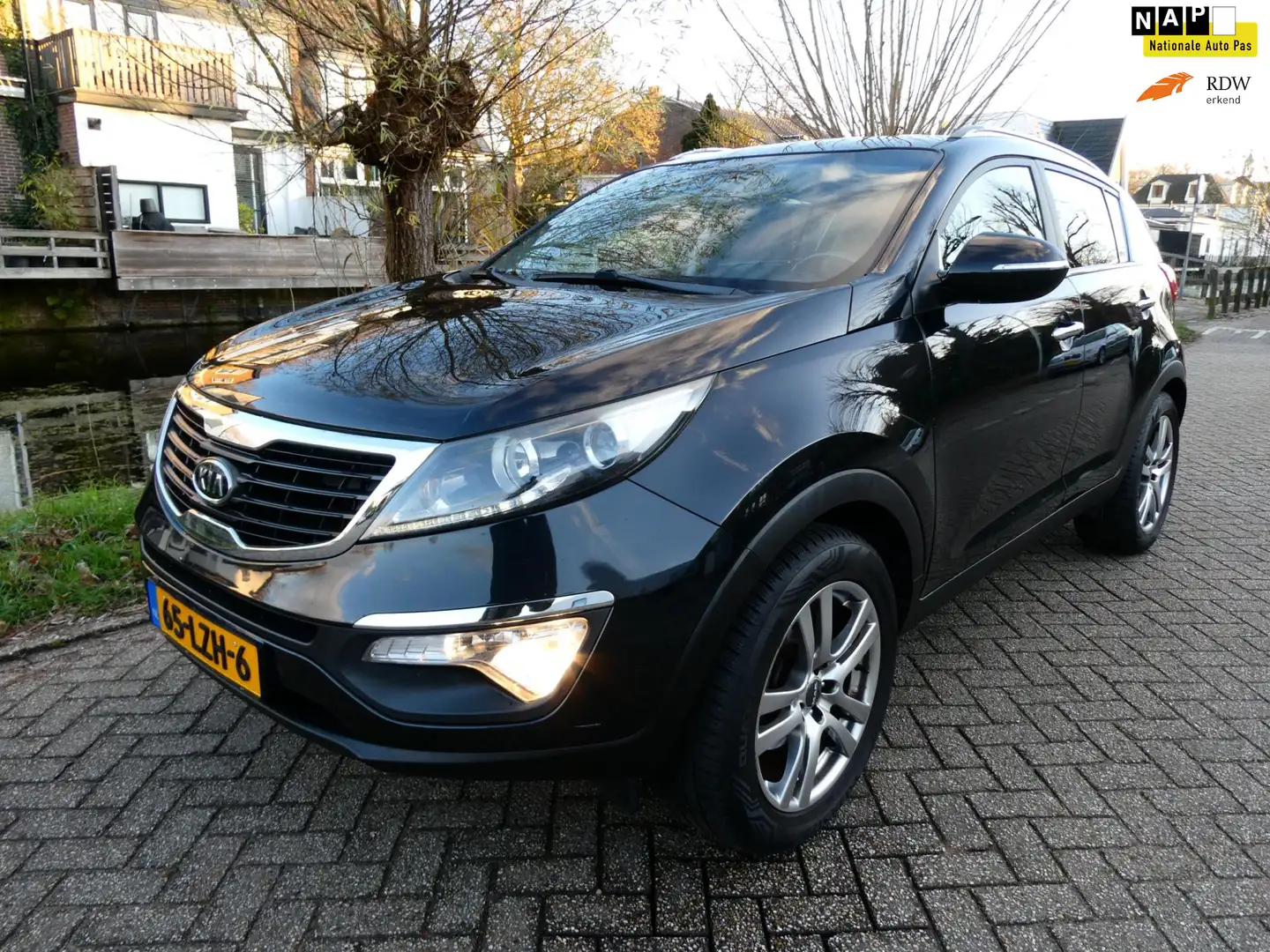 Kia Sportage 2.0 X-ecutive Plus Pack 163pk Clima Cruise Trekhaa Noir - 1