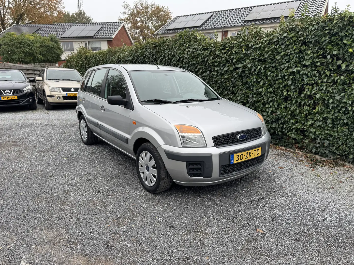 Ford Fusion 1.4-16V Cool & Sound | Airco | Elekt. Ramen | APK Gris - 1
