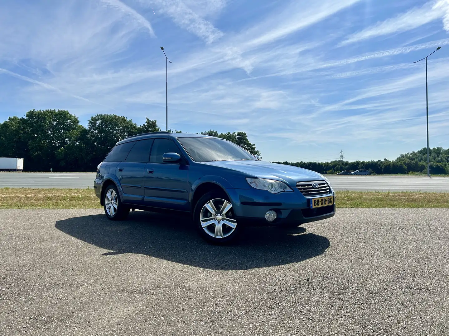 Subaru Legacy 2.5 Outback AWD | Trekhaak | Nieuwe APK | Blauw - 1