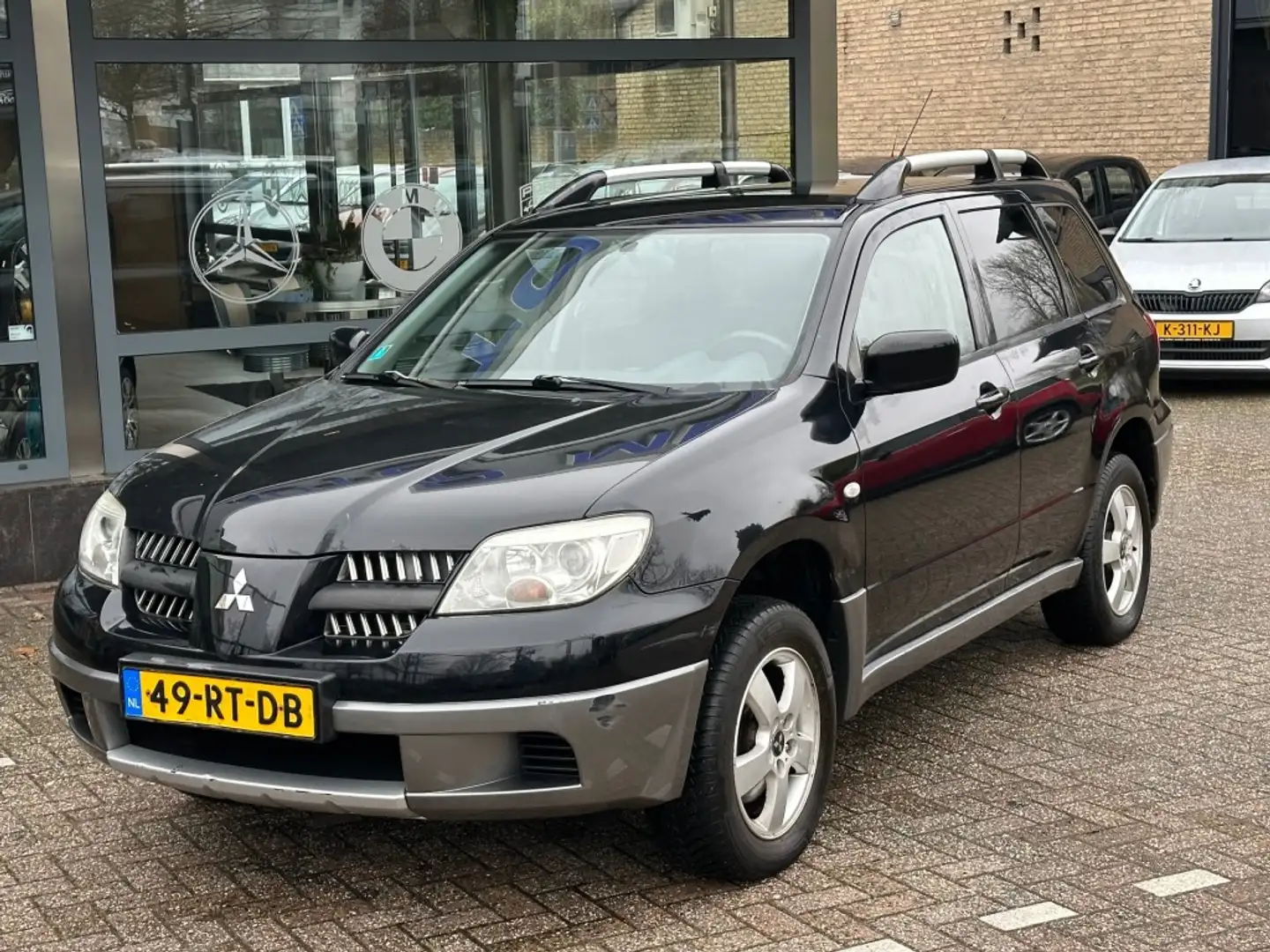 Mitsubishi Outlander 2.0 INVITE PLUS Airco Trekhaak prijs voor EXPORT Schwarz - 2