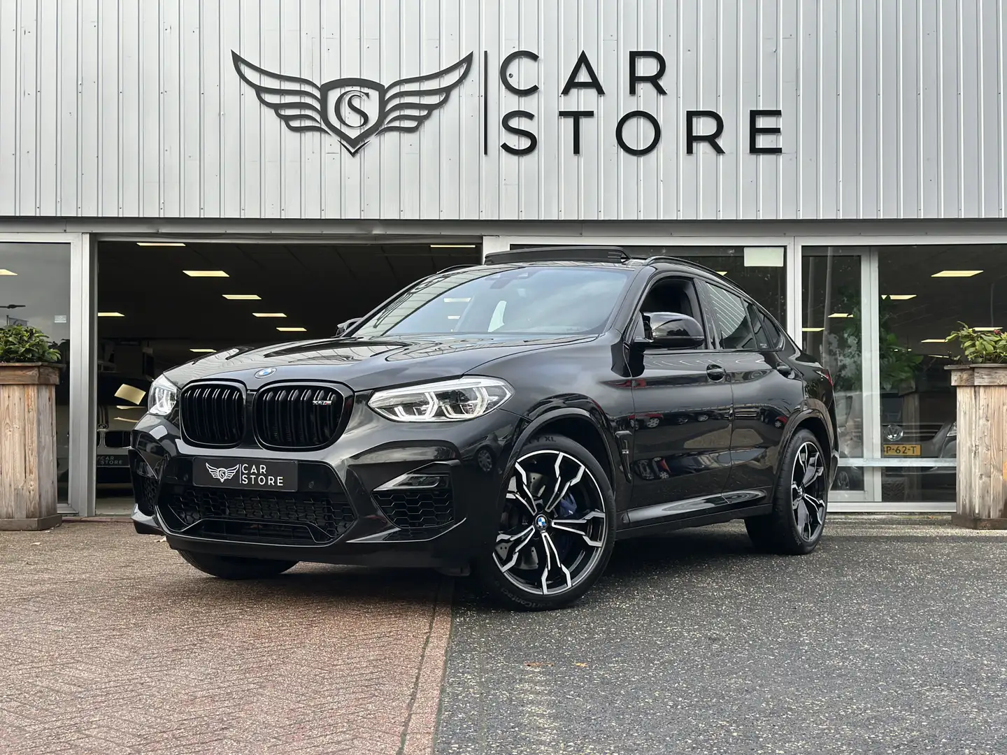 BMW X4 M Competition 510PK|CARBON|PANO|HARMAN KARDON|LEDER| Zwart - 1