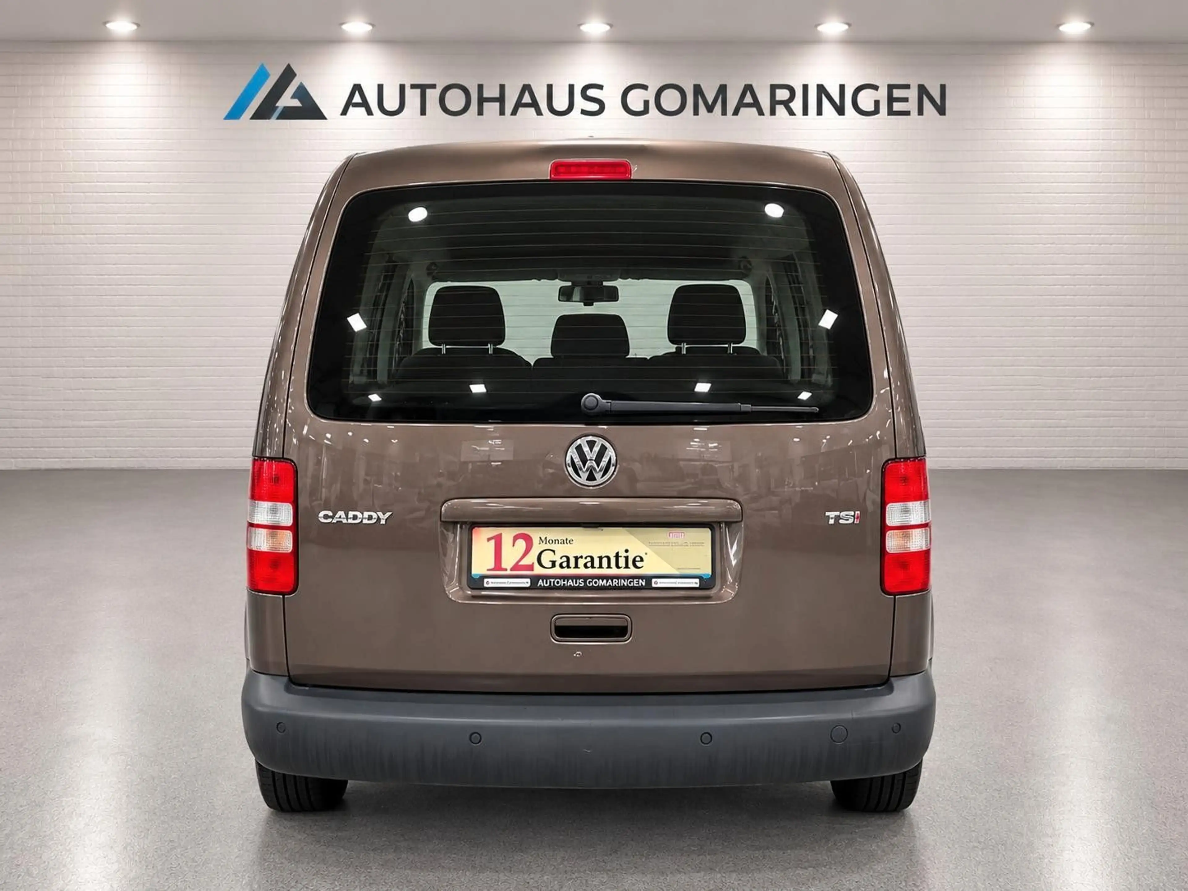 Volkswagen Caddy Kombi*1.Hand*TÜV Neu*SHZ*Klimaaut*STHZ* — photo 6