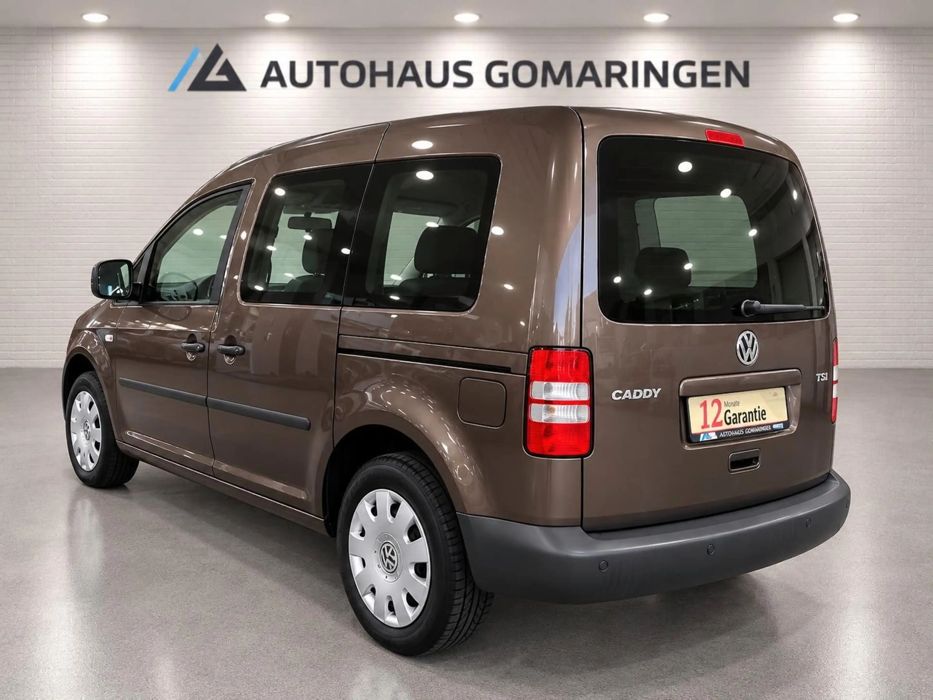 Volkswagen Caddy Kombi*1.Hand*TÜV Neu*SHZ*Klimaaut*STHZ* — photo 7