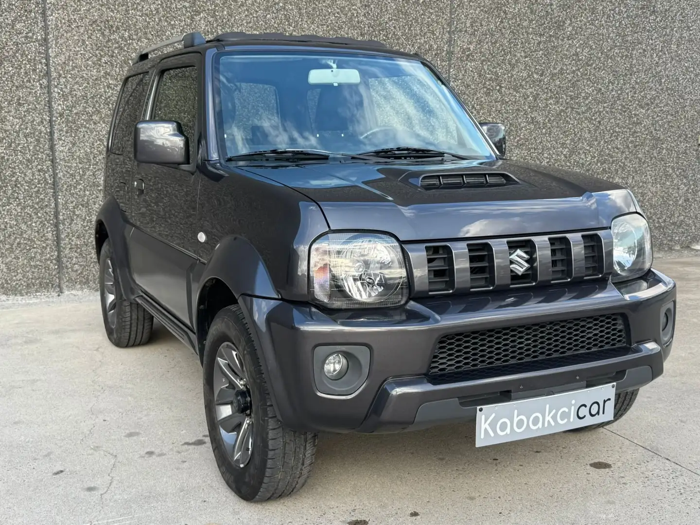 Suzuki Jimny 1.3i JLX Air//CARNET//CLIM//GARANTIE 12M Grigio - 1