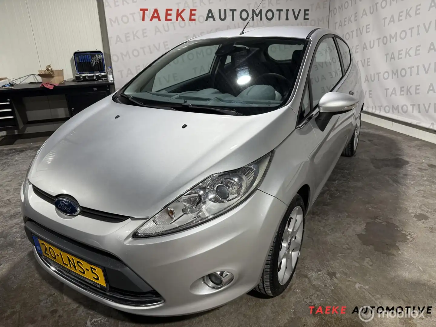 Ford Fiesta 1.25 Titanium Clima/Cruise/Nap/1e EIG Сірий - 1