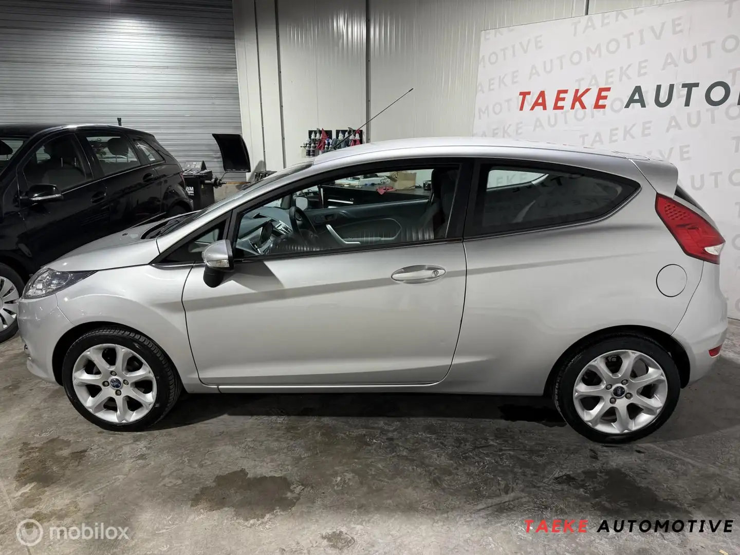 Ford Fiesta 1.25 Titanium Clima/Cruise/Nap/1e EIG Сірий - 2