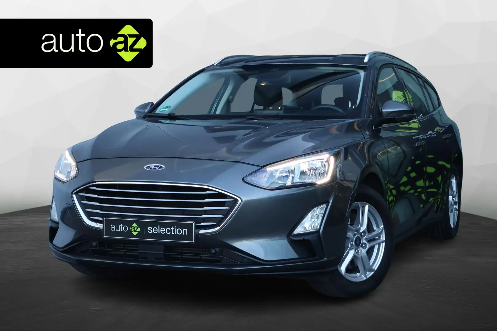 Ford Focus Wagon 1.0 EcoBoost Trend Edition Business Grijs - 1