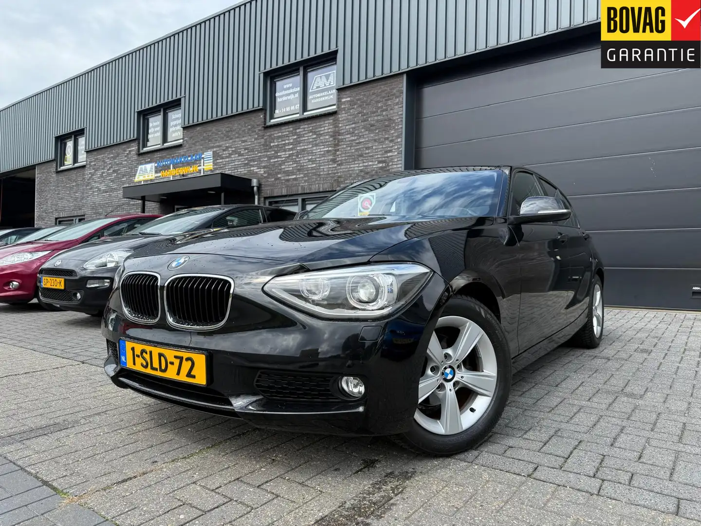 BMW 116 1-serie 116i EDE Executive | 12MND GARANTIE | XENO Negro - 1