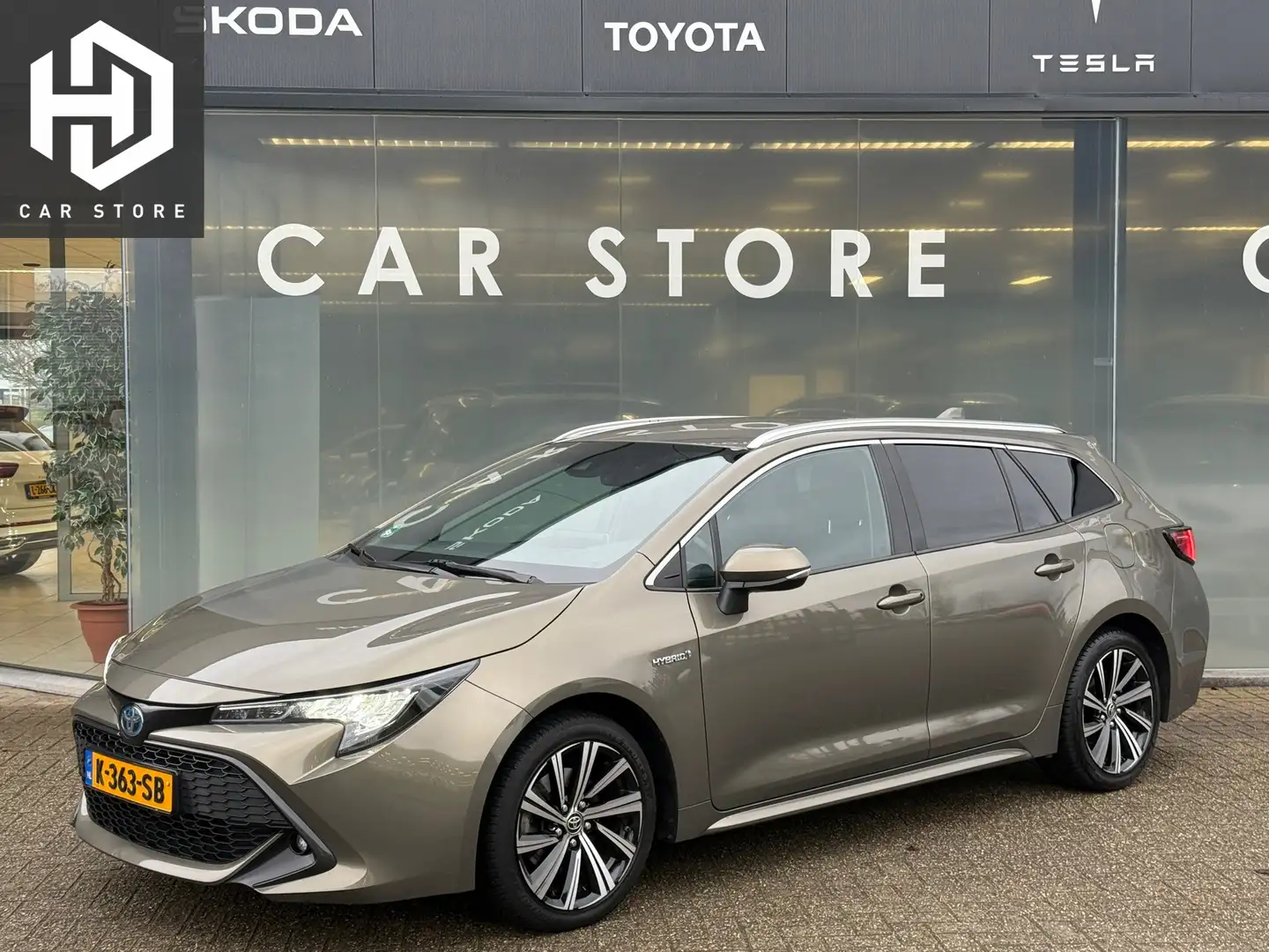 Toyota Corolla Touring Sports 2.0 Hybrid Dynamic Grün - 1