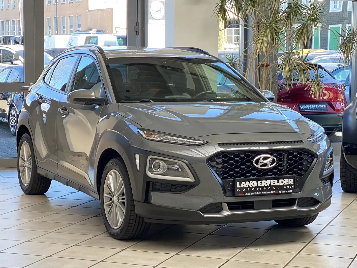 Hyundai KONA KONA1YES! Plus |NAVI|KAMERA|KRELL|HUD|L+SHZ|CARPY Grau - 1