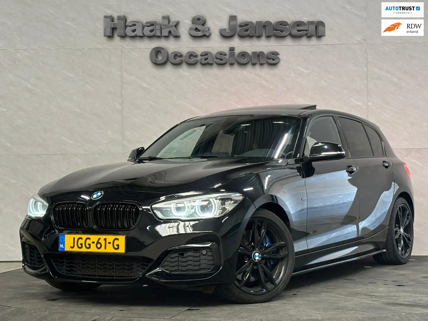 BMW 140 1-serie M140i xDrive Executive - M Sport - Pano - Schwarz - 1
