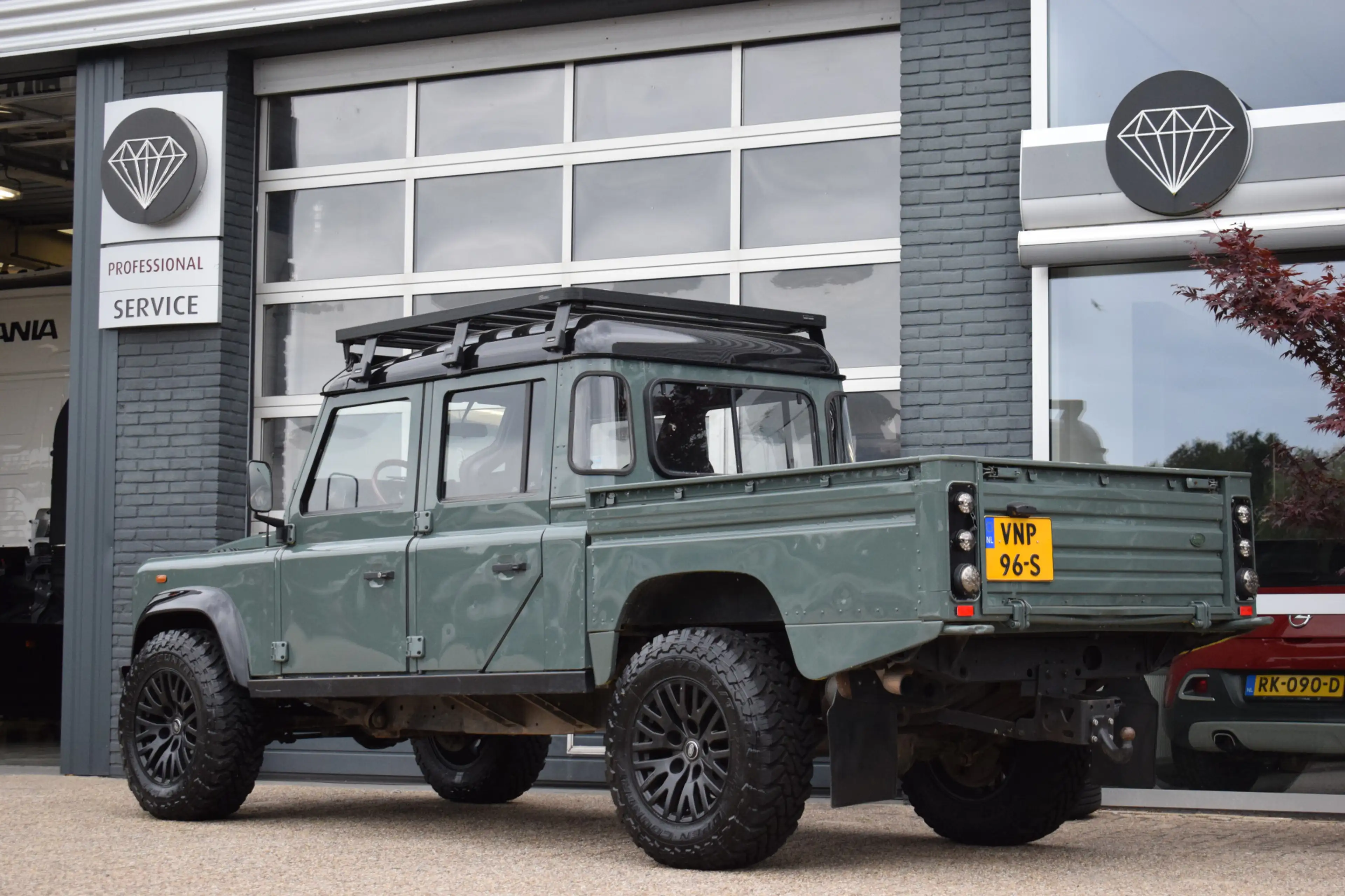 Land Rover Defender 2.5 Td5 SW 130" SE Keswick Green | Sawtooth | Ledb — photo 2