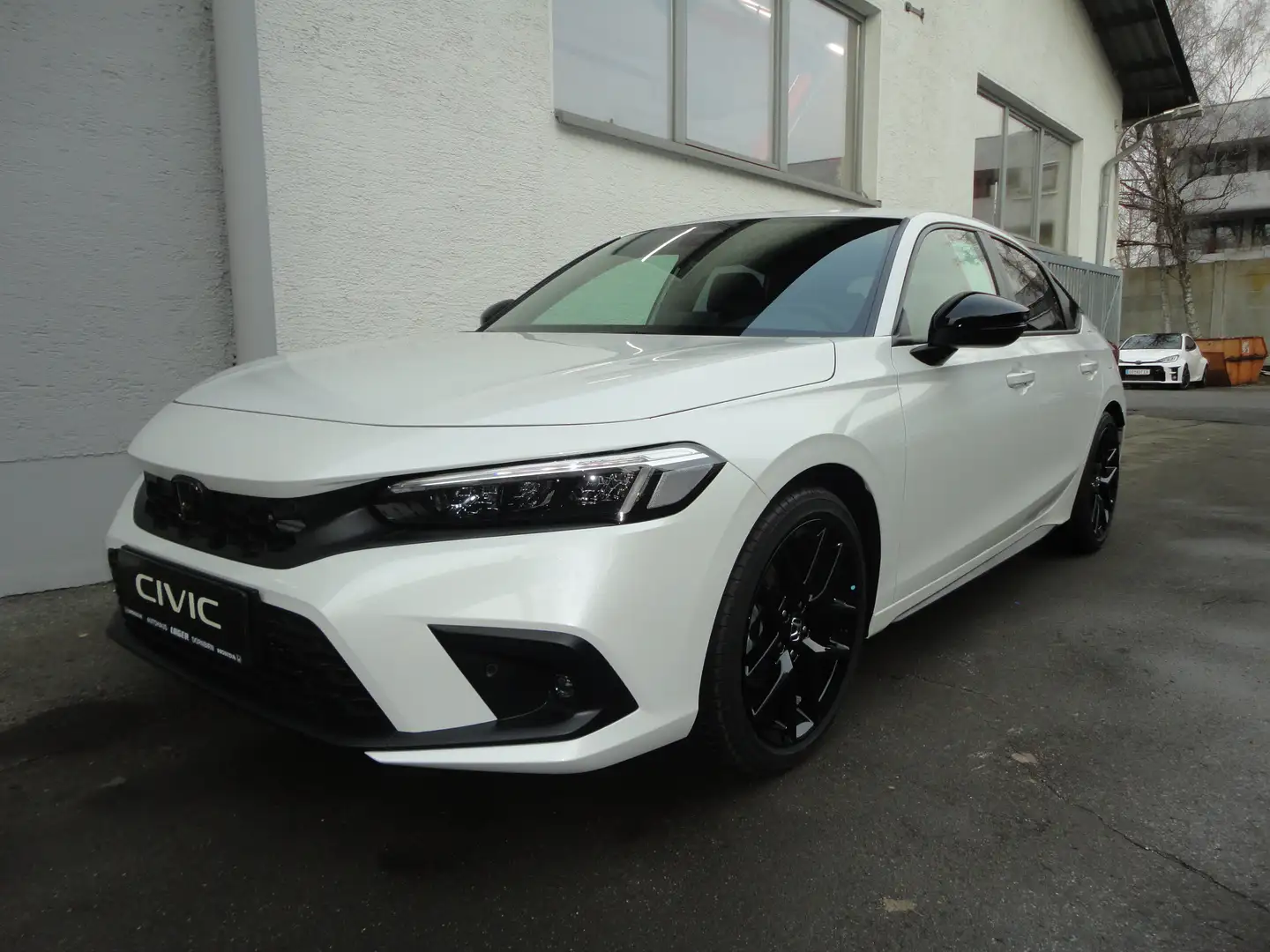 Honda Civic 2.0 i-MMD Hybrid Sport e-CVT  Emblem Paket Schwarz Weiß - 1