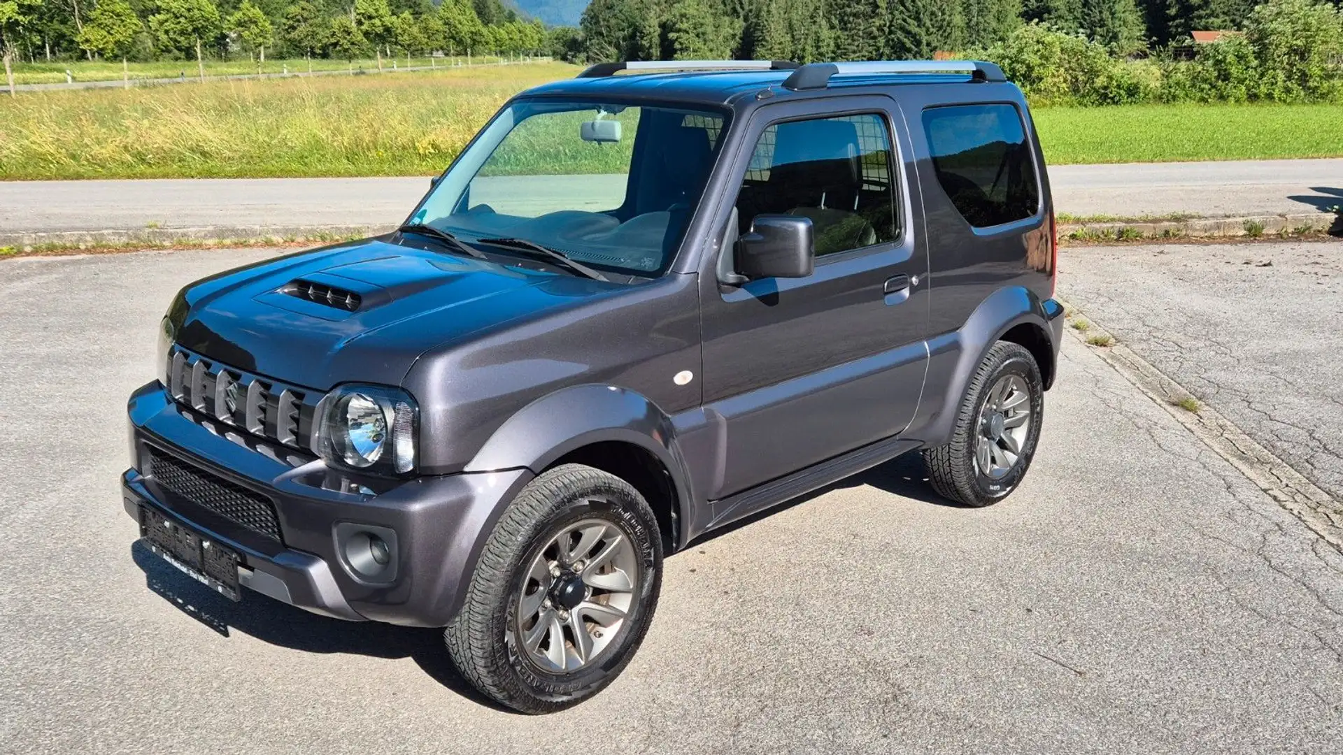 Suzuki Jimny Ranger Comfort Lim. Grau - 1
