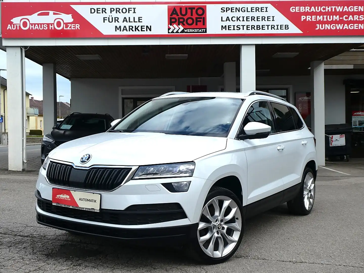 Skoda Karoq 1,5 TSI Style 125 DSG *AHK, KESSY, Rü.Kam* Weiß - 1