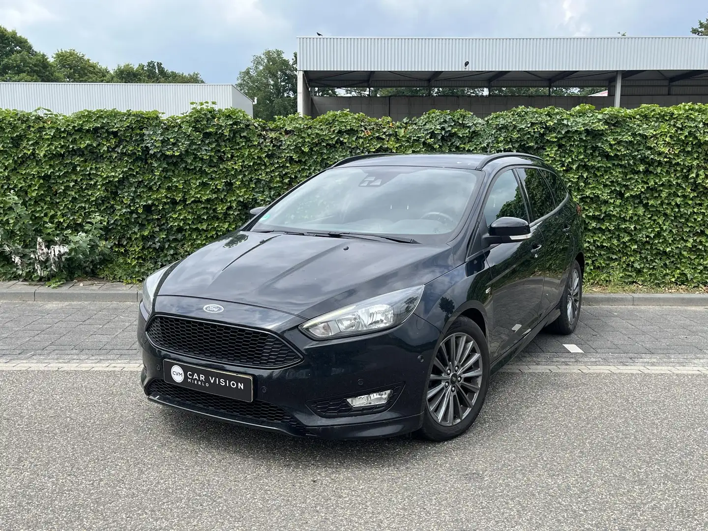 Ford Focus Wagon 1.0 ST-Line * Carplay * Cruise * Navi * Nieu Zwart - 1