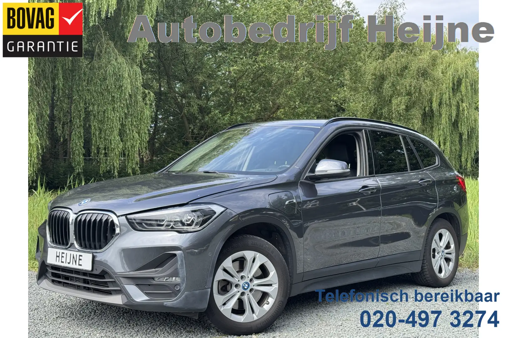 BMW X1 xDrive25e EXECUTIVE LEDER/NAVI/CAMERA Grijs - 1