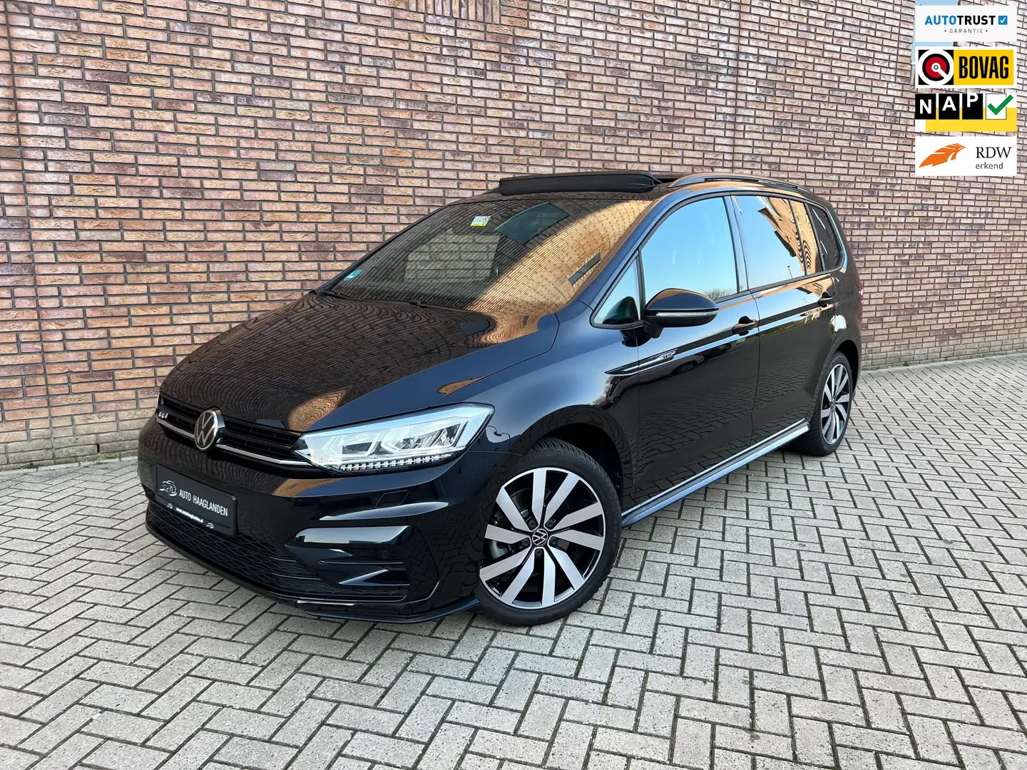 Volkswagen Touran 1.5 TSI 3 x R-line 7p Pano-keyless-V-cockpit-CAM-A Zwart - 1