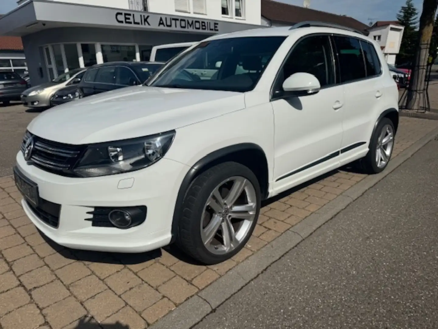 Volkswagen Tiguan 1.4 TSI Sport & Style BMT R-Line Wit - 1