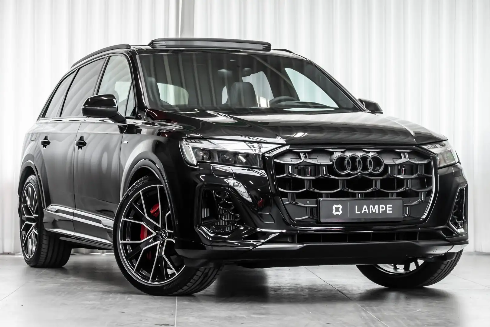 Audi Q7 60 TFSIe 5j GARANTIE S Line Massage Pano Trekh B&O Zwart - 1