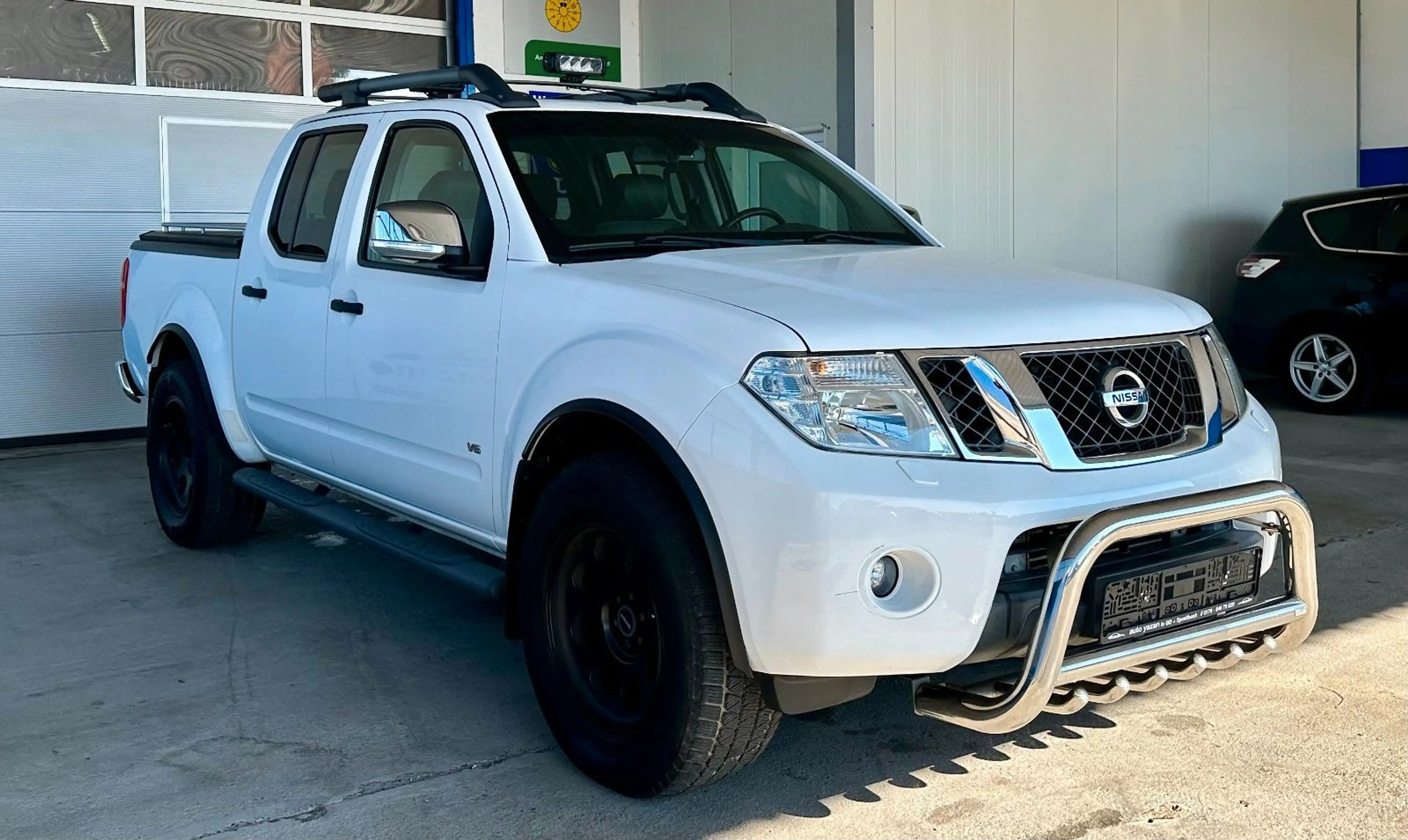 Nissan Navara Pickup Double Cab LE V6 4X4 / Kamera /SHZ — photo 9