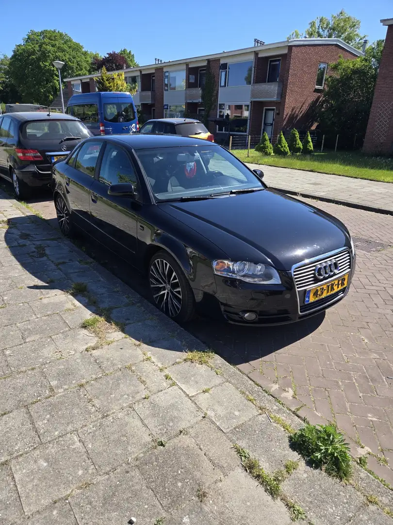 Audi A4 2.0 TFSI Pro Line Zwart - 1
