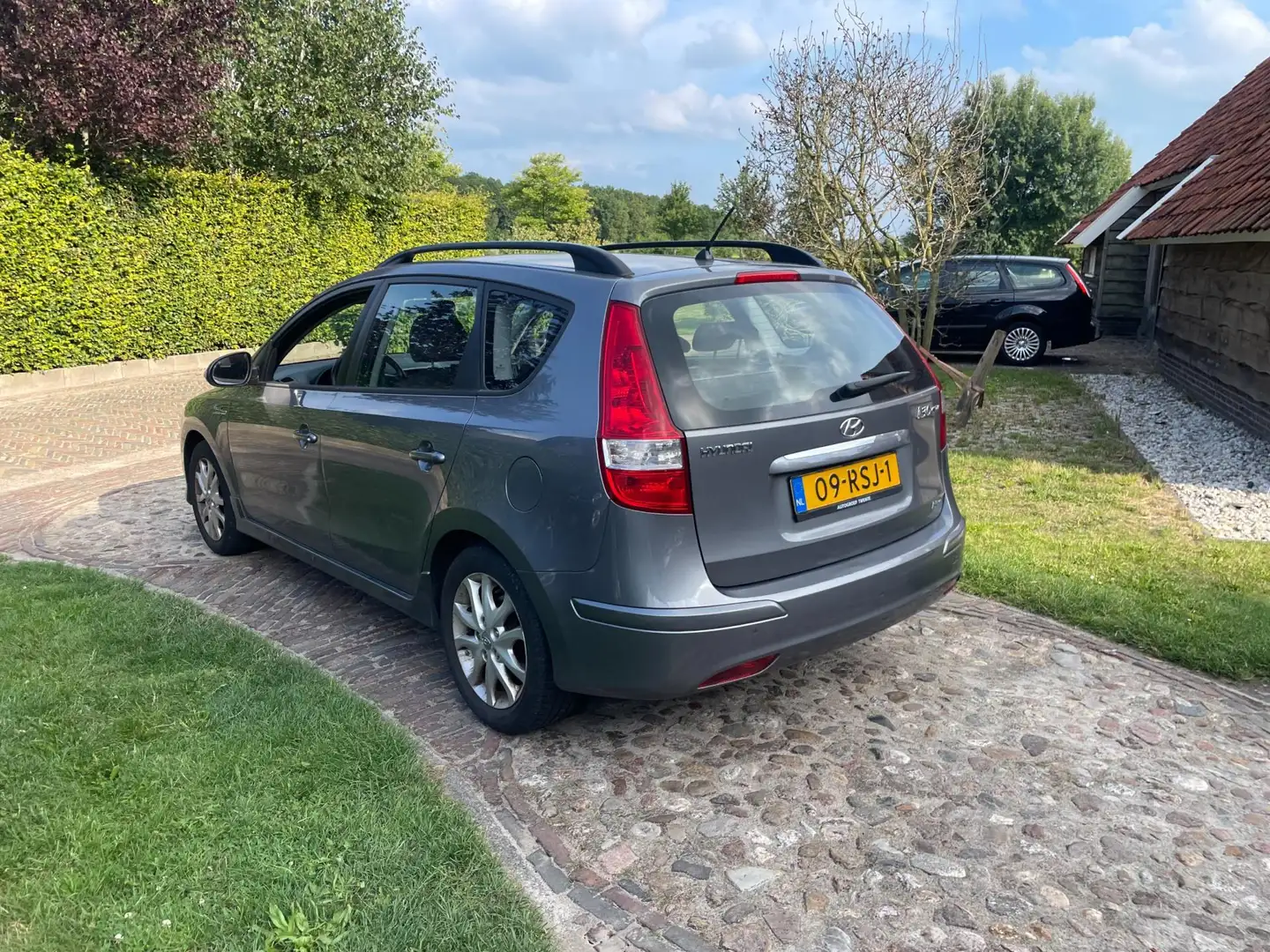 Hyundai i30 CW 1.4i i-Motion Business-NL auto-Airco-PDC-LMV- Grijs - 2