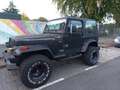 Jeep Wrangler Wrangler 4.0i Laredo Zwart - thumbnail 1