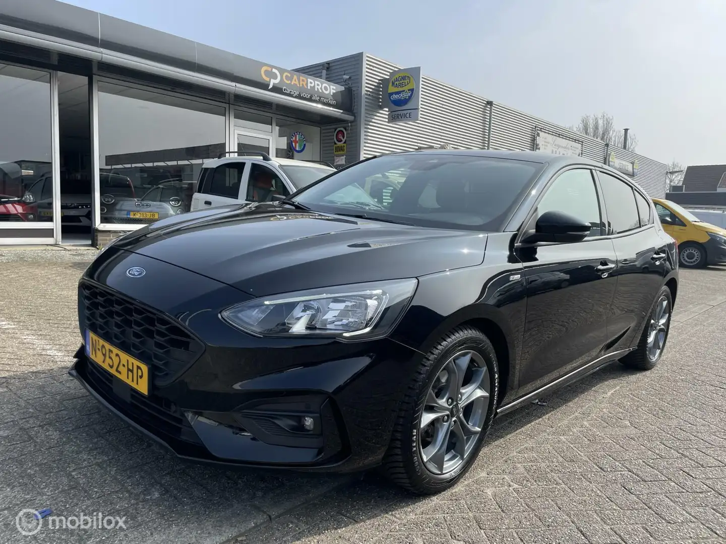 Ford Focus 1.0 Eco Hybrid ST Line, prachtige staat! Zwart - 1