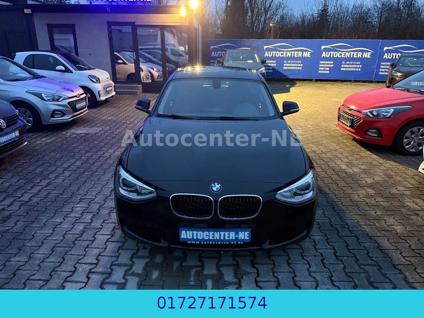 BMW 116 i/Klimaautomatik/Xenon/Navi/Schiebedach Schwarz - 1