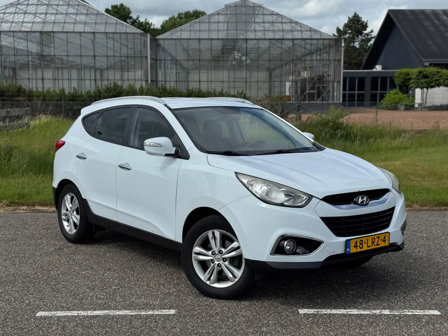 Hyundai iX35 2.0i Style Airco | Cruise | Climate | Trekhaak | A Weiß - 2