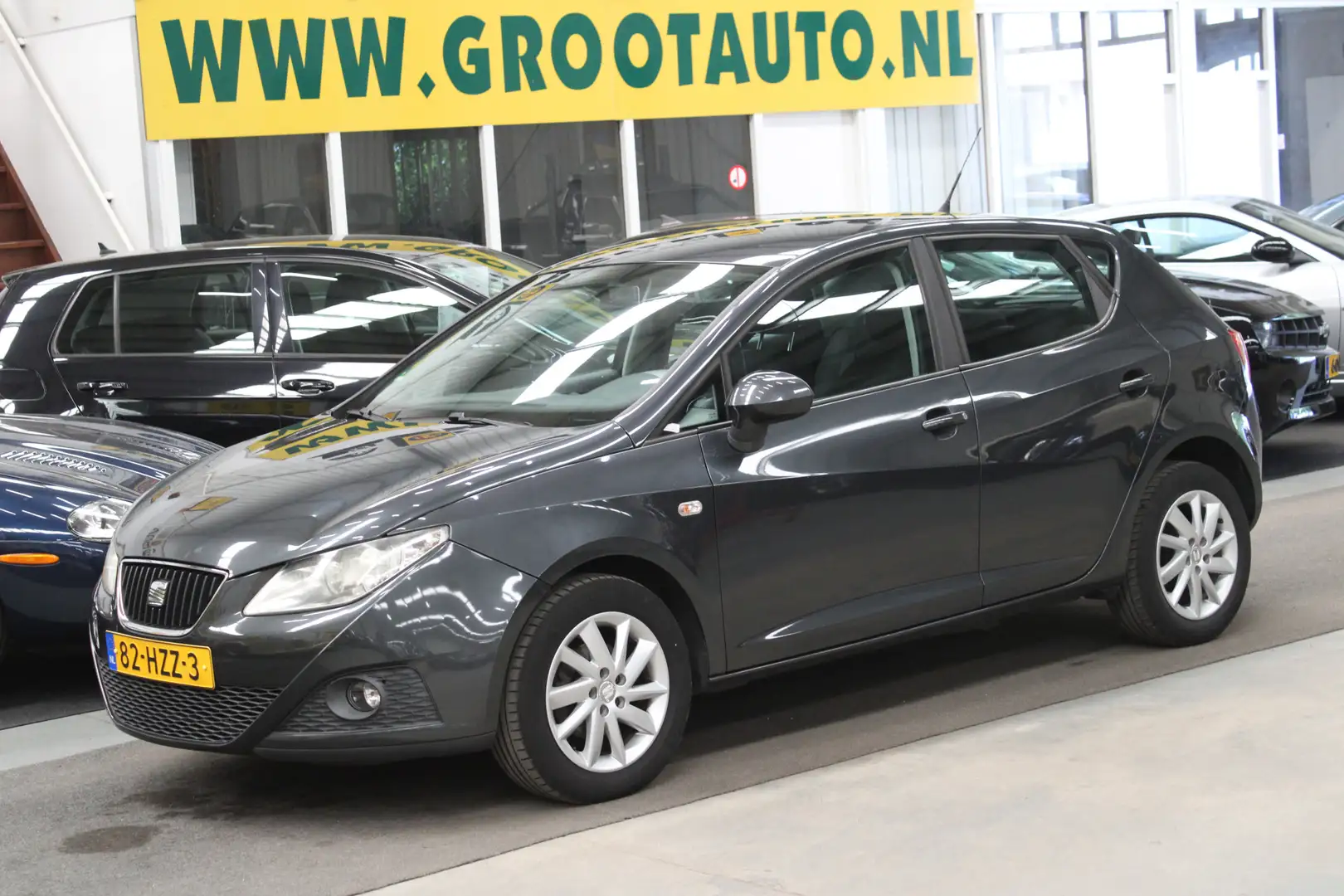 SEAT Ibiza 1.4 Stylance NAP, Airco, Cruise control, Stuurbekr Grijs - 1