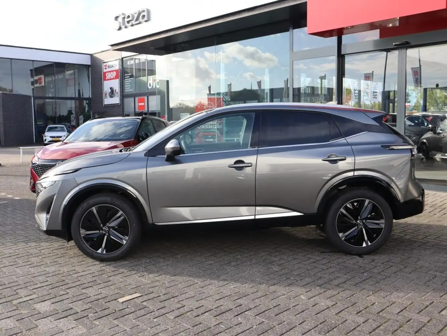 Nissan Qashqai 1.3 MHEV 140PK Tekna / Cold Pack / Leer Grijs - 2