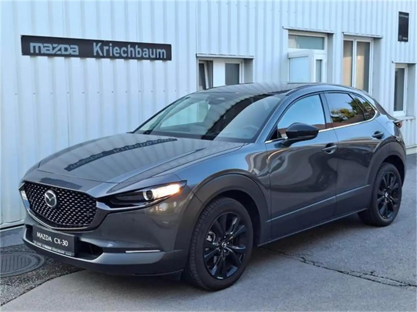 Mazda CX-30 e-Skyactive G140 Nagisa Aut. Grau - 1