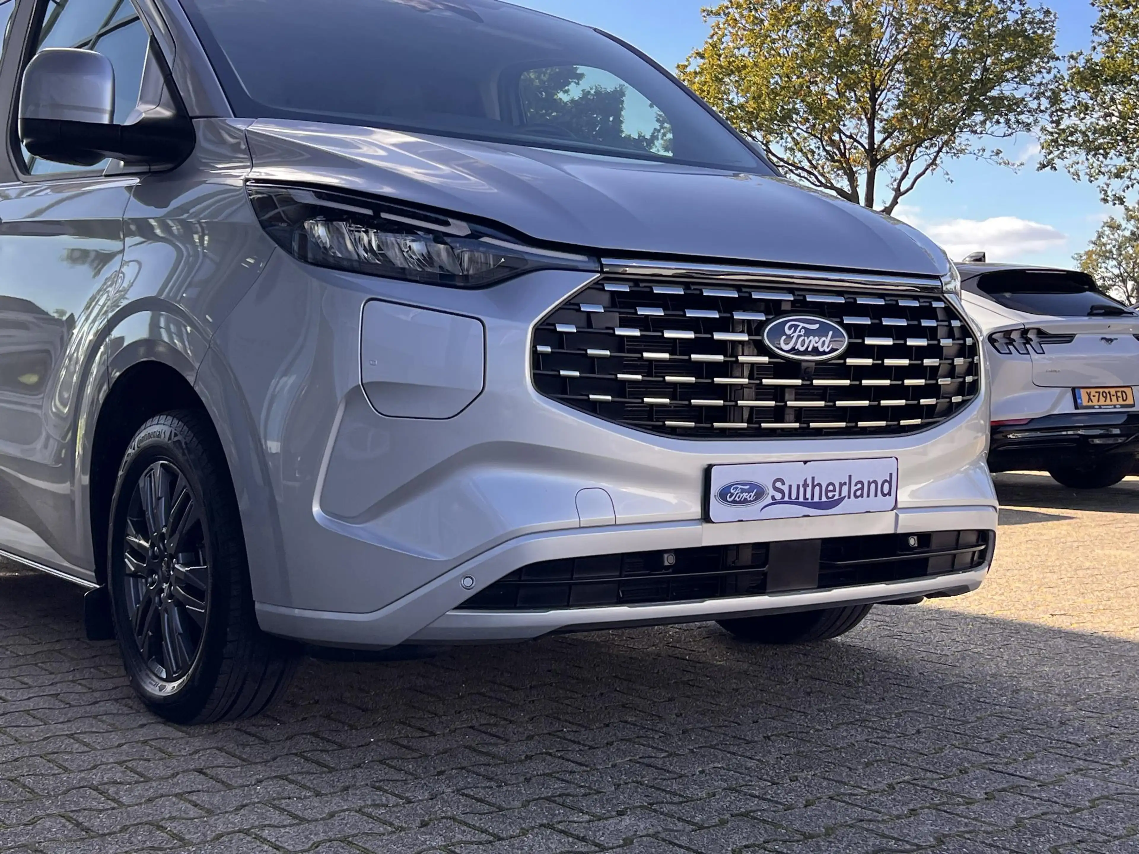 Ford Transit Custom Tourneo 340 2.5 PHEV L1H1 Titanium 9 persoons Comb — photo 3