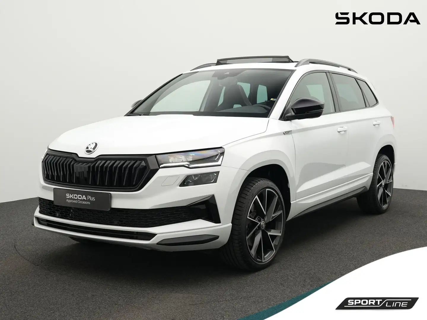 Skoda Karoq 1.5 TSI 150 pk DSG Sportline Business | Panoramada Blanc - 1
