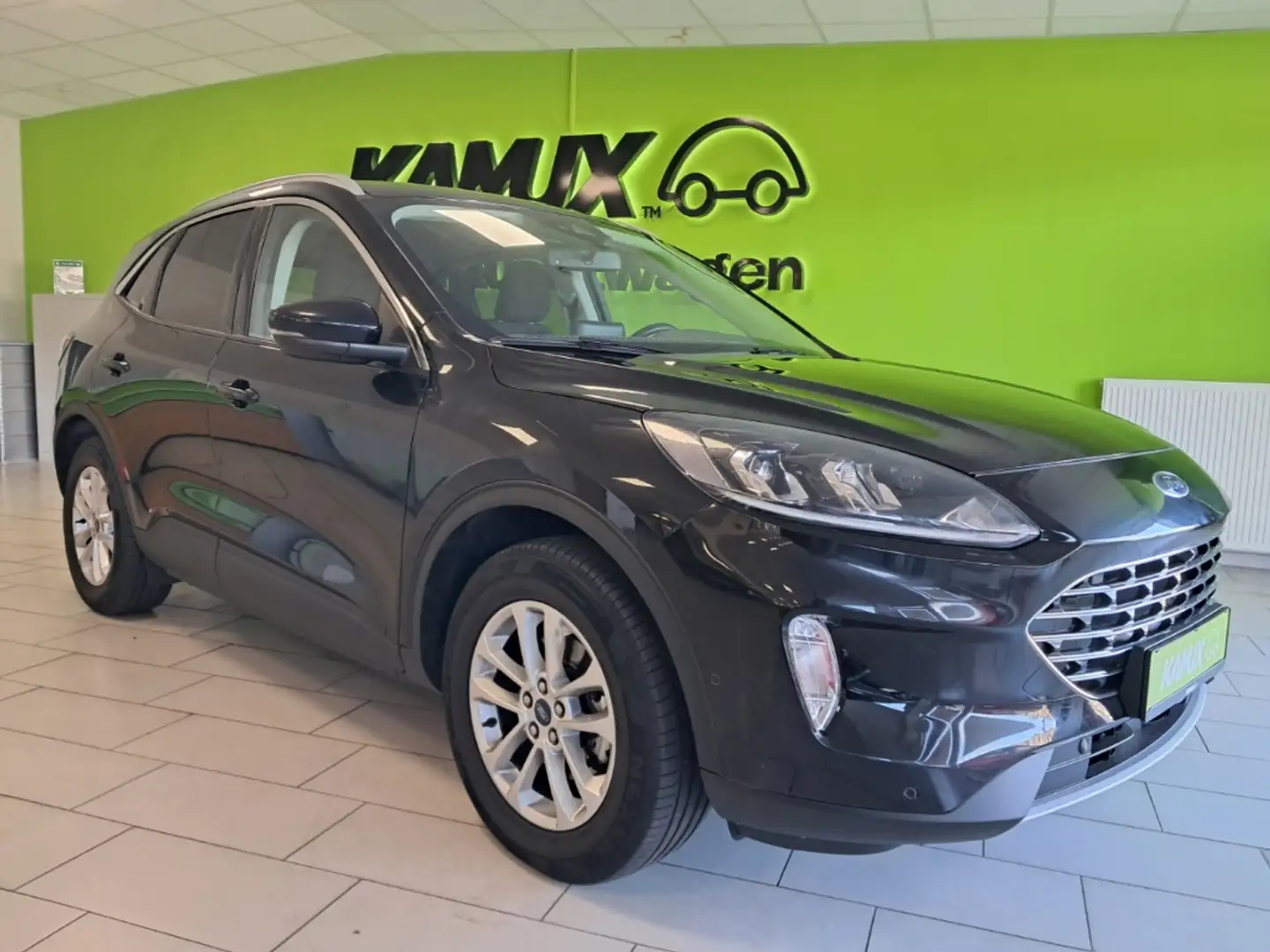 Ford Kuga 1.5EB Titanium+LED+NAVI+AHK+TEMPO+CARPLAY Zwart - 1