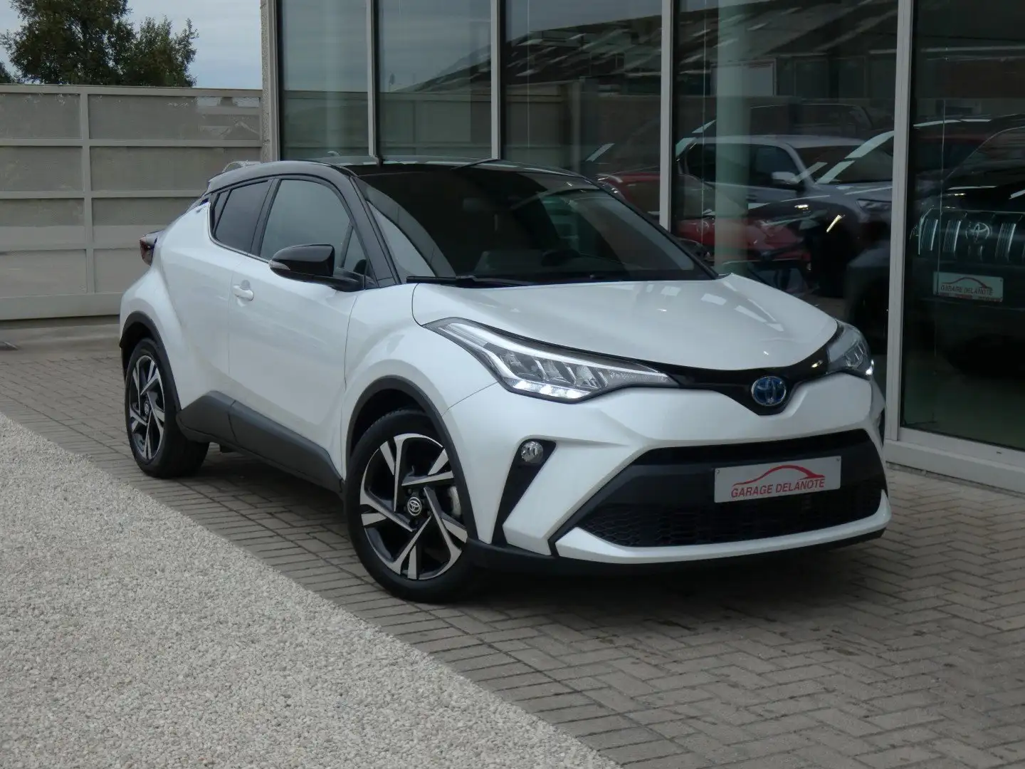 Toyota C-HR 1.8i HYBRID C-Lub +TREKHAAK+GPS+Dodehoek+Carplay Wit - 1