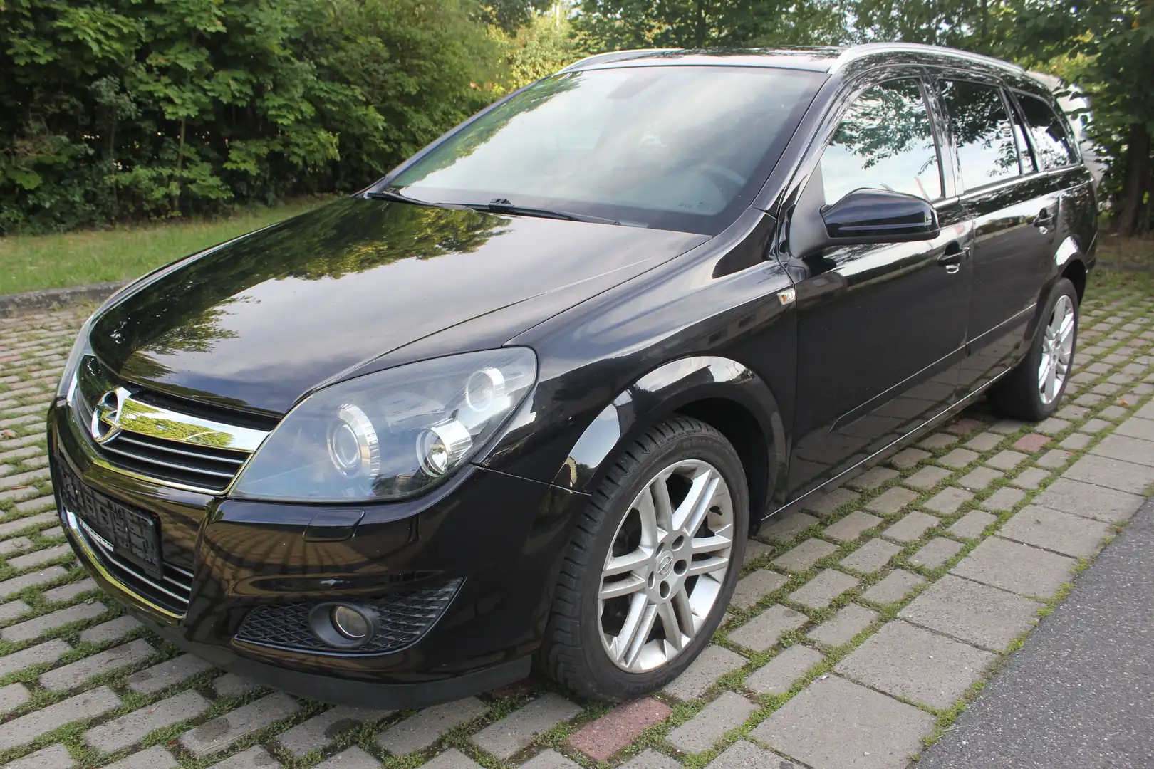Opel Astra 1.8 Caravan+NAVI+PDC+XENON+TEMP+SHZ Negro - 1