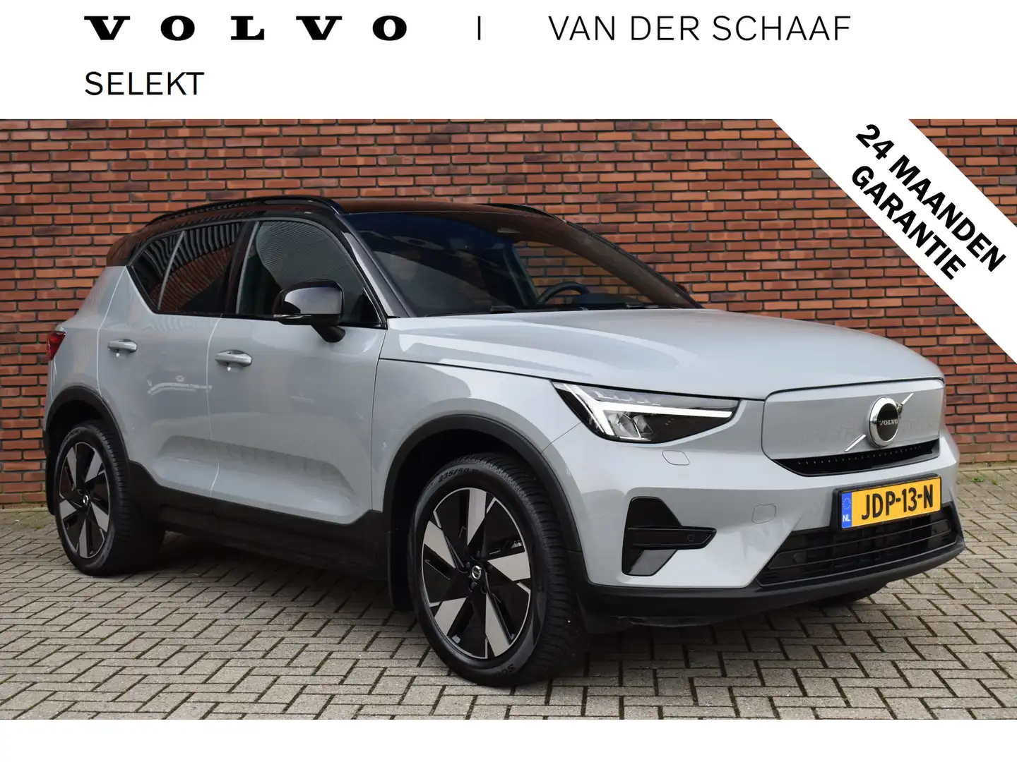 Volvo XC40 Extended Range 252PK Plus 82 kWh | Trekhaak | Stoe Grijs - 1
