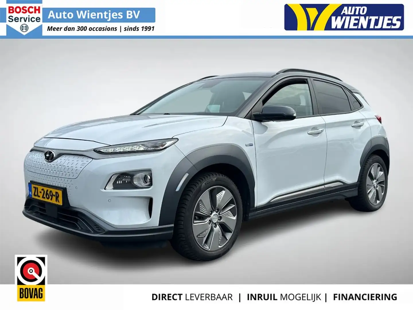 Hyundai KONA EV Premium 64kWh | SoH 94% | Leer | Navi | Trekhaa Blanc - 1