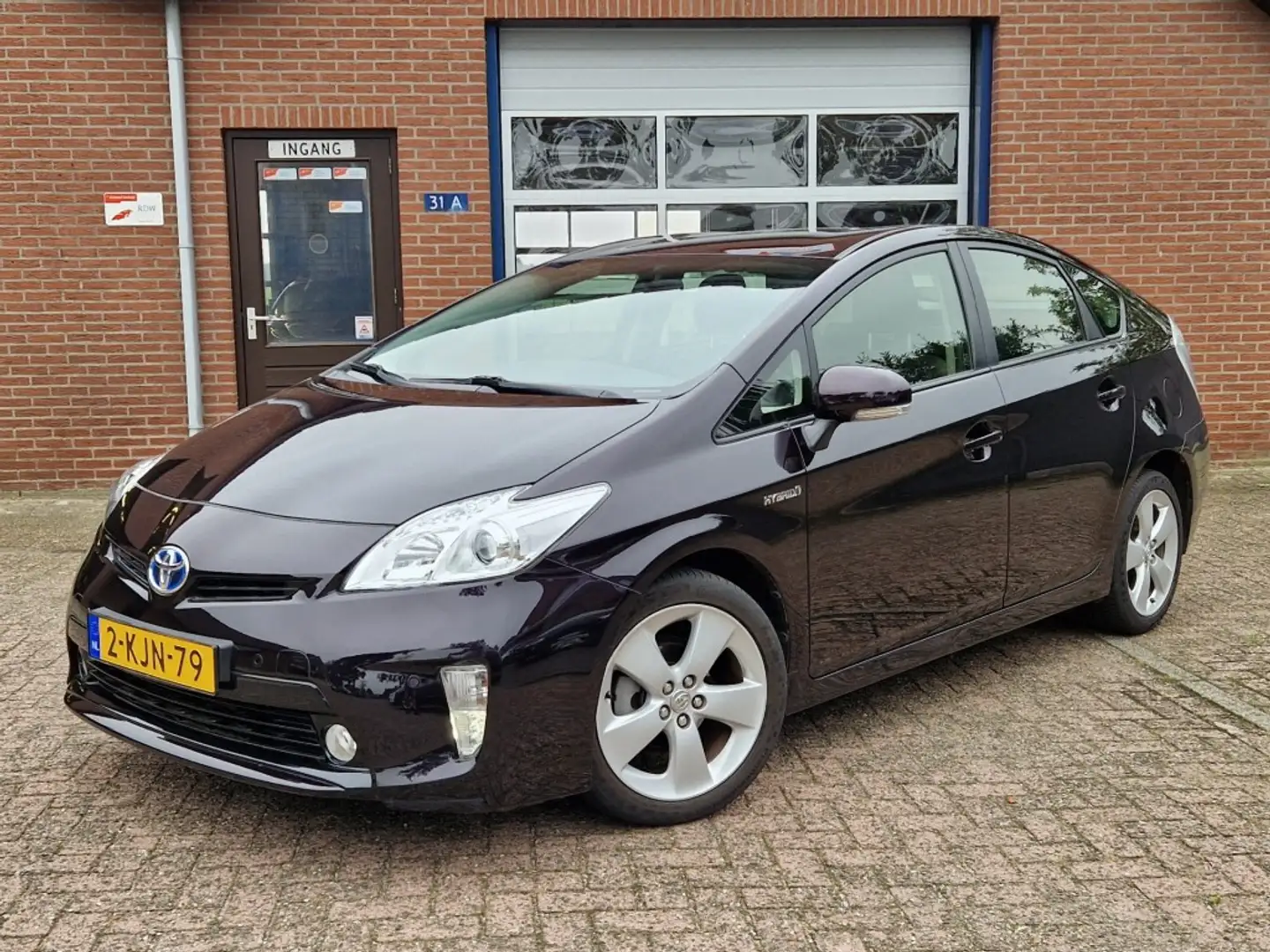 Toyota Prius 1.8 Hybrid Dynamic Business Navigatie NL-auto Crui Mauve - 1